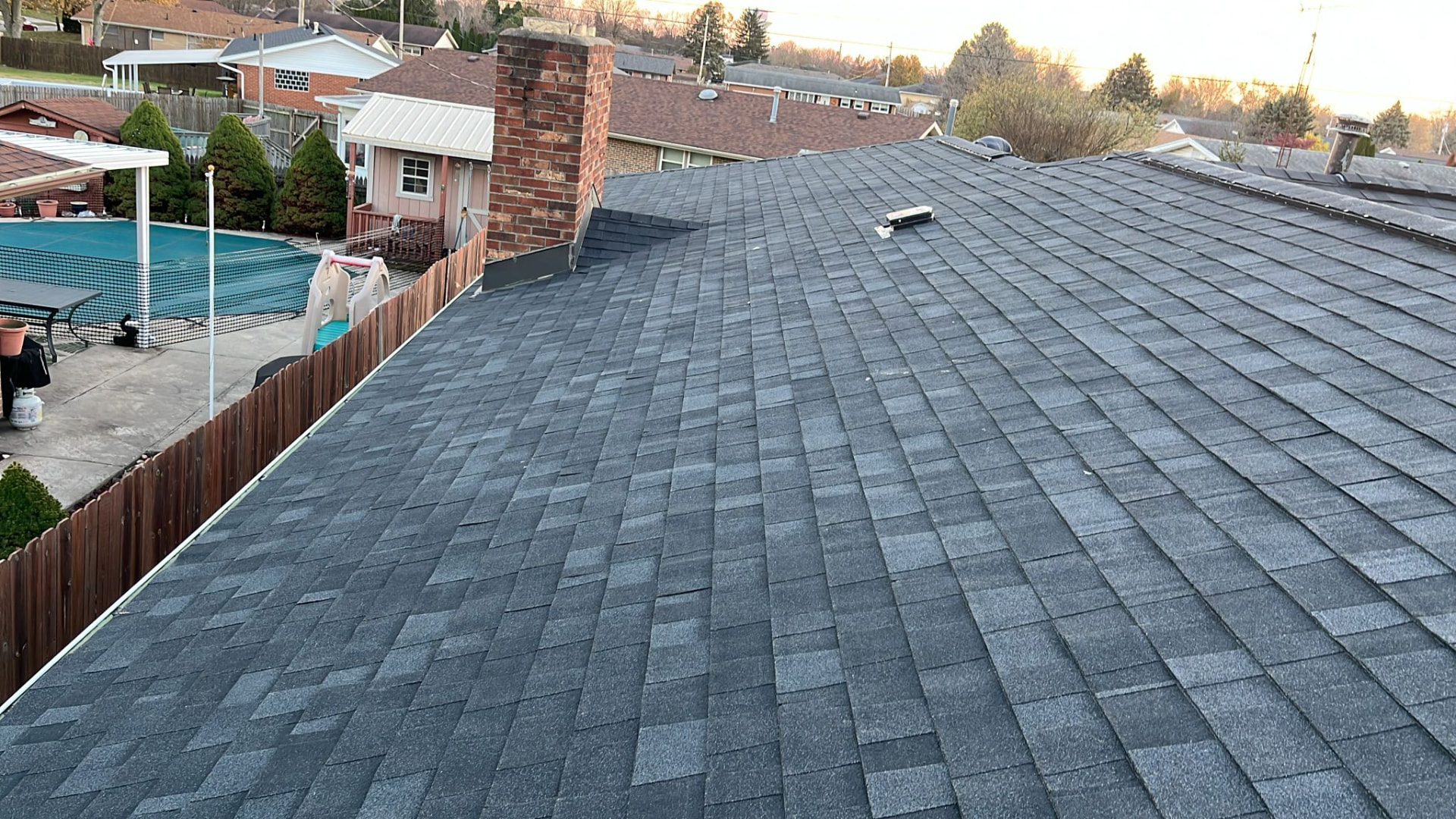 After: new charcoal architectural shingle roof installed